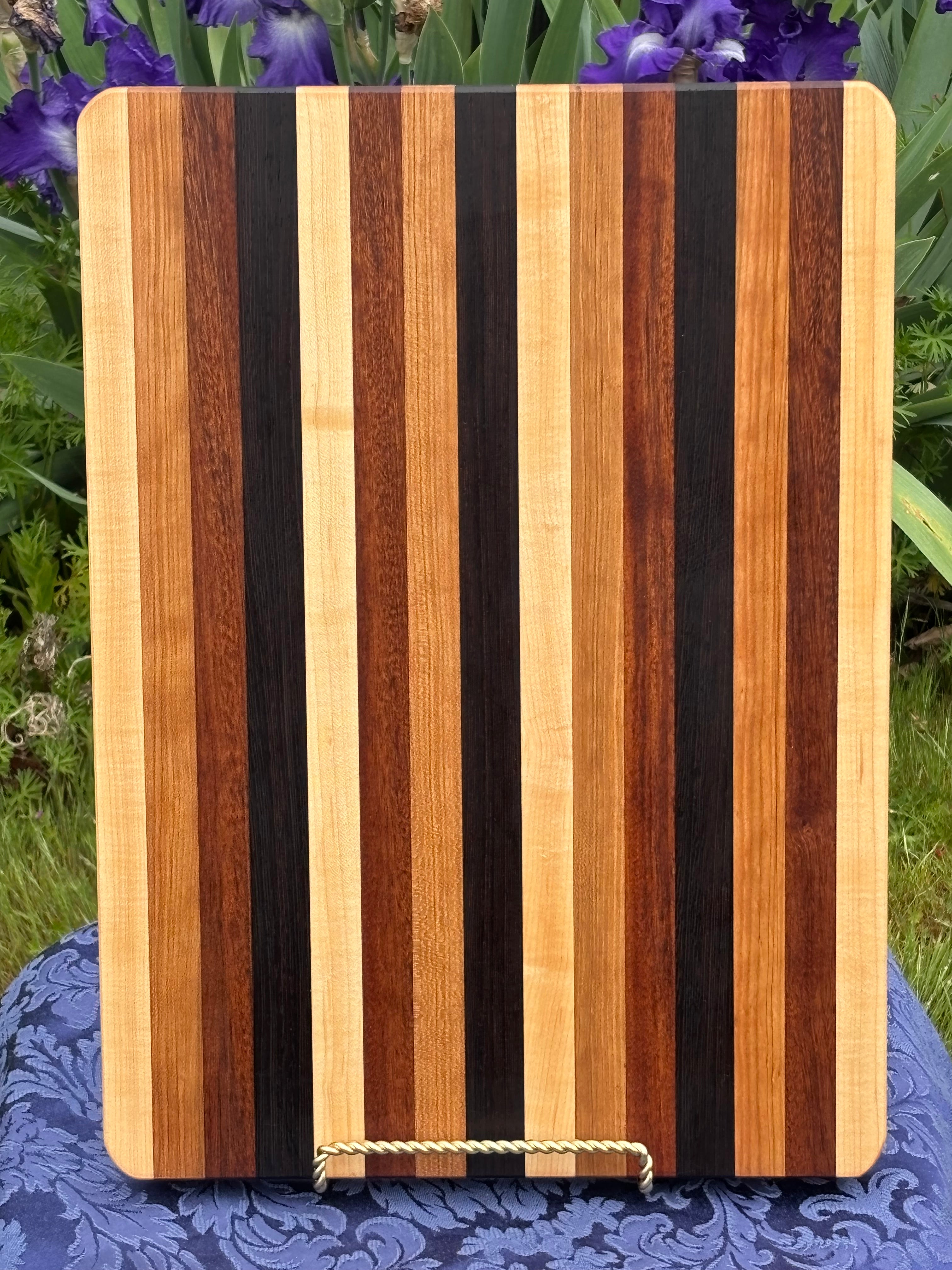Classic edge grain Cutting Board made from Maple, Walnut, Cherry highlighted with Wenge