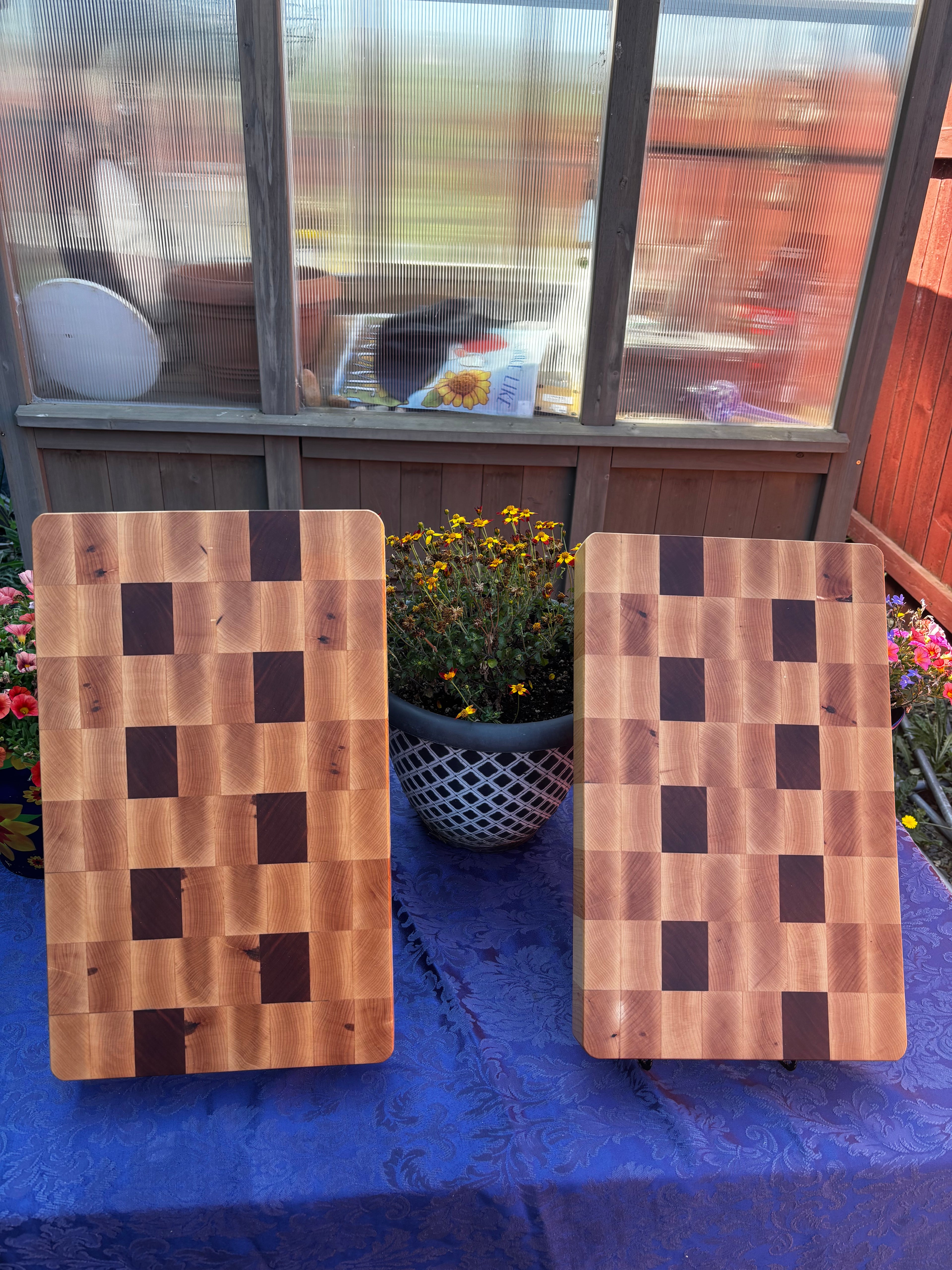 Maple and Chery wood end grain cutting board(s) made in the style of a butcher block. Thickness of these boards are 2 1/8" wts are 12.0 , 13 lb 